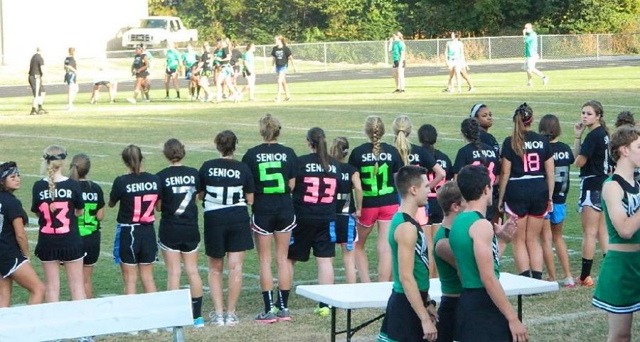 Seniors support each other during their win. 