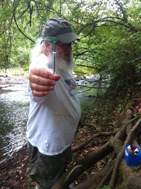 Mr. Delisle helps Adopt-A-Streamers with dissolved oxygen sampling.