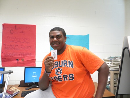 Senior Cameron Scott proudly holds up his free Chick-fil-a coupon. 