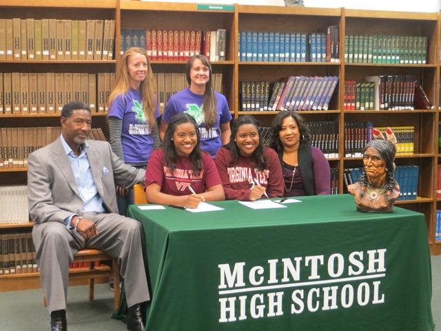 Rhegan and Rhana Mitchell who are both attending Virginia Tech for volleyball signed together.