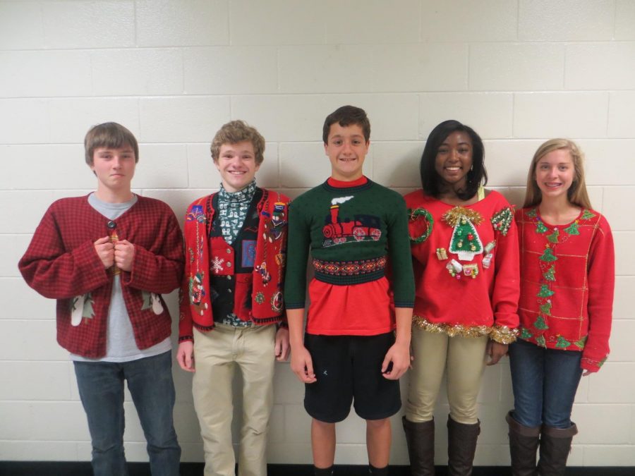 Contestants+pose+in+a+line+for+Mrs.+Owen+to+judge+their+sweaters