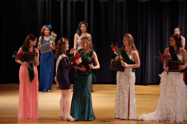 Emily Miller is crowned Miss McIntosh 2014 by former Miss McIntosh 2012, Marguerite Murrell. 