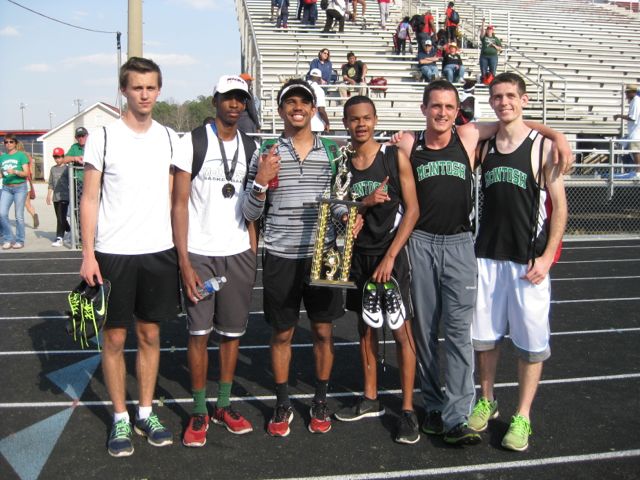 Members of the MHS varsity boys track & field team celebrate their win with the championship trophy. From left to right: Michael Daprano, Johnathan Hall, Taylor Huntley, Justin Brown, Josh Reynolds, Josh Mattingly. 