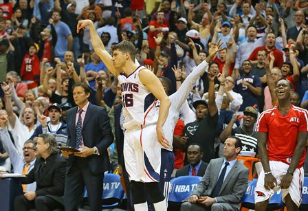 Kyle Korver drills a three-pointer as the hawks go on to win game three.