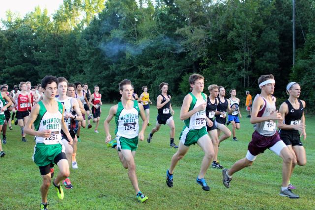 (From left to right) Juniors Brian Doyle, Tyler Nigro and Connor Reynolds start the varsity boys race. 
