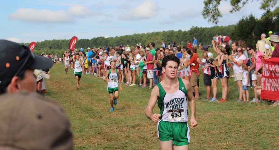 Junior Zander Wilson, Senior John Oliver, and Junior Denver Williams finishing the Junior Varsity race.