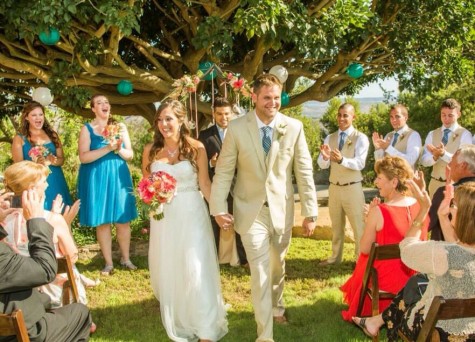 Mrs. Barnett leaves the wedding alter with her husband after saying their vows