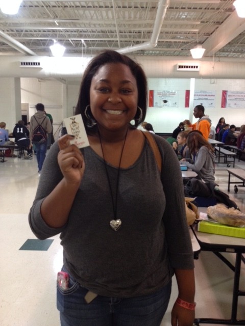 Senior Bianca Carthern wins a free Chick-fil-A sandwich coupon in the weekly give-away. 