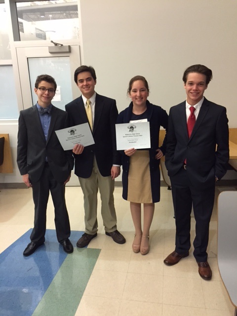 Trial 2 lawyers prepare for case. Sam Ellis (left), Jackson Fuentes (center left), Christina Cortes (center right), and Mikey Muller (right) received awards for placing in the top third at the Alpharetta High Debate Tournament.