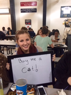 Senior Rachel Compagno shows how animals are the way to her heart.