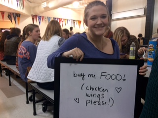 Senior Savannah Massingill shows her preference for a date.