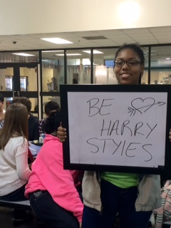 Freshman Jawahir Ahmed shows how she will say yes to a date.