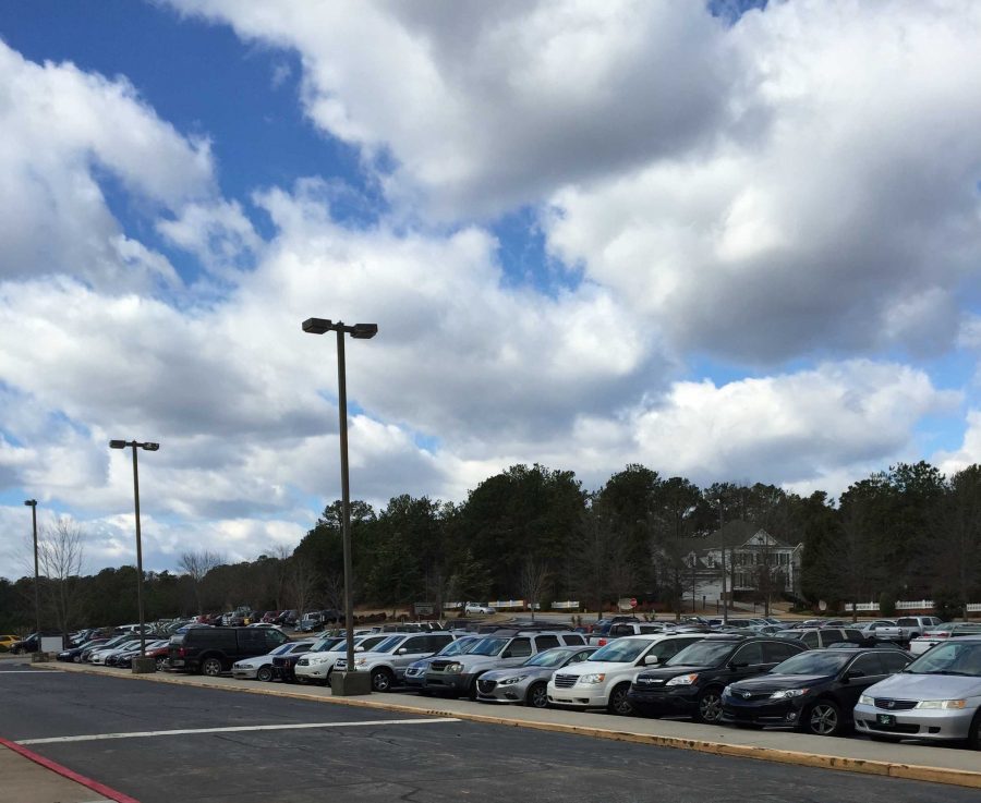 The school's parking lot is typically filled with cars, making it difficult to leave after school ends.