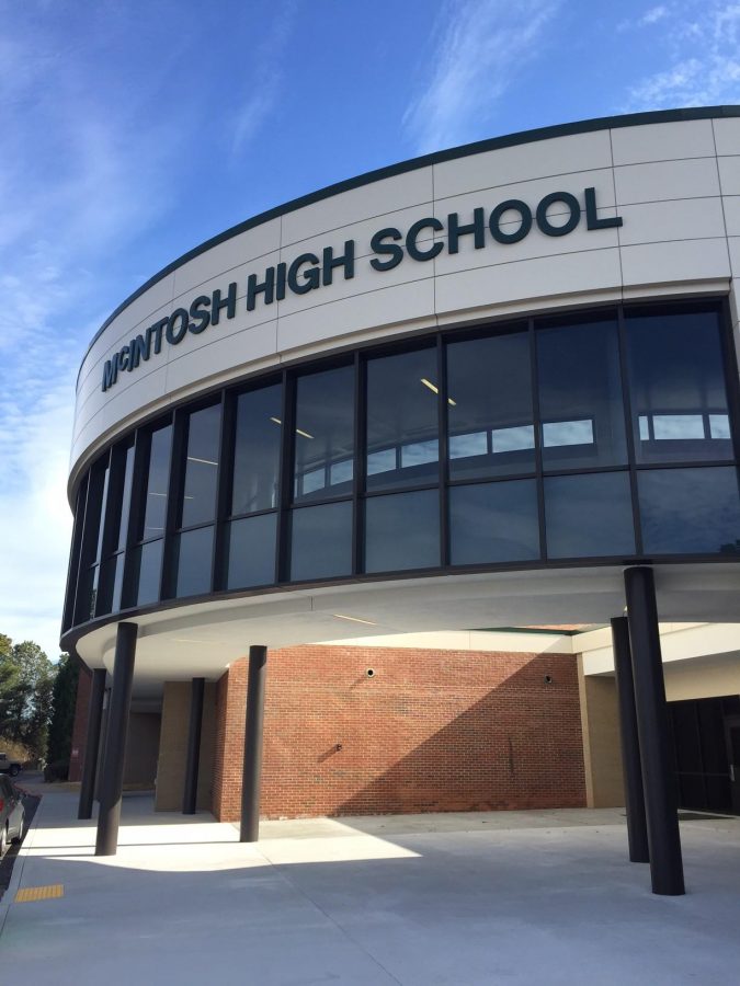 The name of the school is impressively embossed on the front of the walkway.