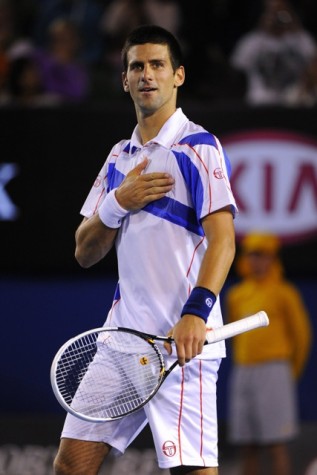 Novak Djokovic celebrates after defeating Switzerland's Roger Federer in the semifinals of the 2011 Australian Open, before going on to defeat Andy Murray in the final.