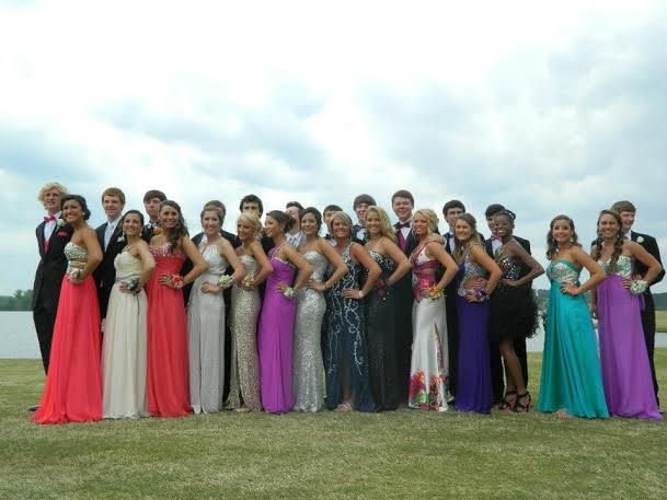 A group of former McIntosh students pose for a pre-prom picture.