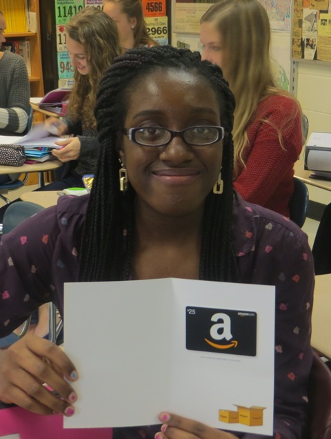 A representative from McIntosh Trail presented a $25 gift card to Chelsea Mbonu in Mr. Kienasts class.