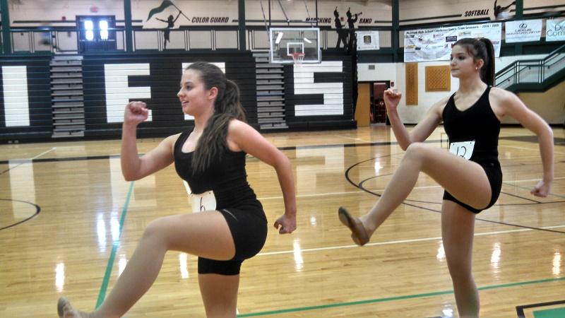 Sophomore Mikhaila Fechushak and Freshman Joslyn Nicosia practice their dance for auditions. 