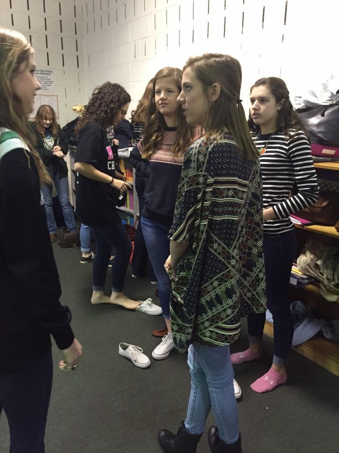 The girls in Bella Voce take a break before dancing. (Photography is not allowed during the practice itself.)