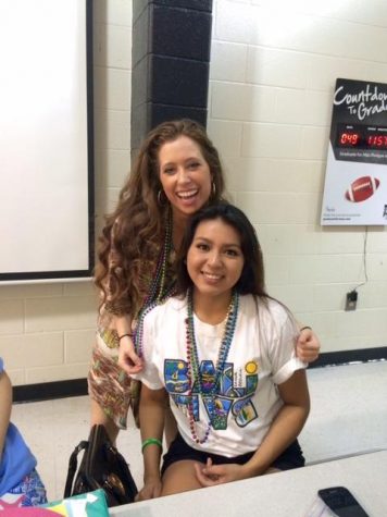 Seniors Alex Ward and Michelle Gonzalez showing off their attire