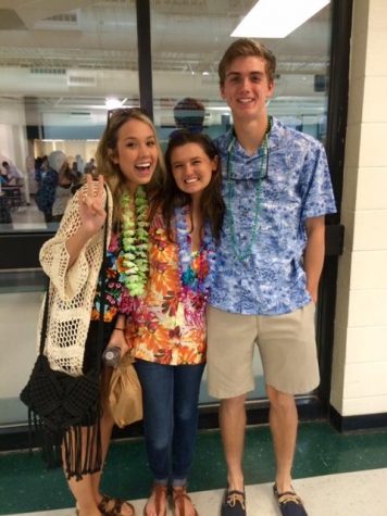 Seniors Jenna Thompson, Bridget Barrett, and Parker Smith wearing their Spring Break spirit wear