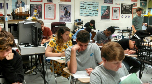 Mr. Jarrell's students work silently while he is out.