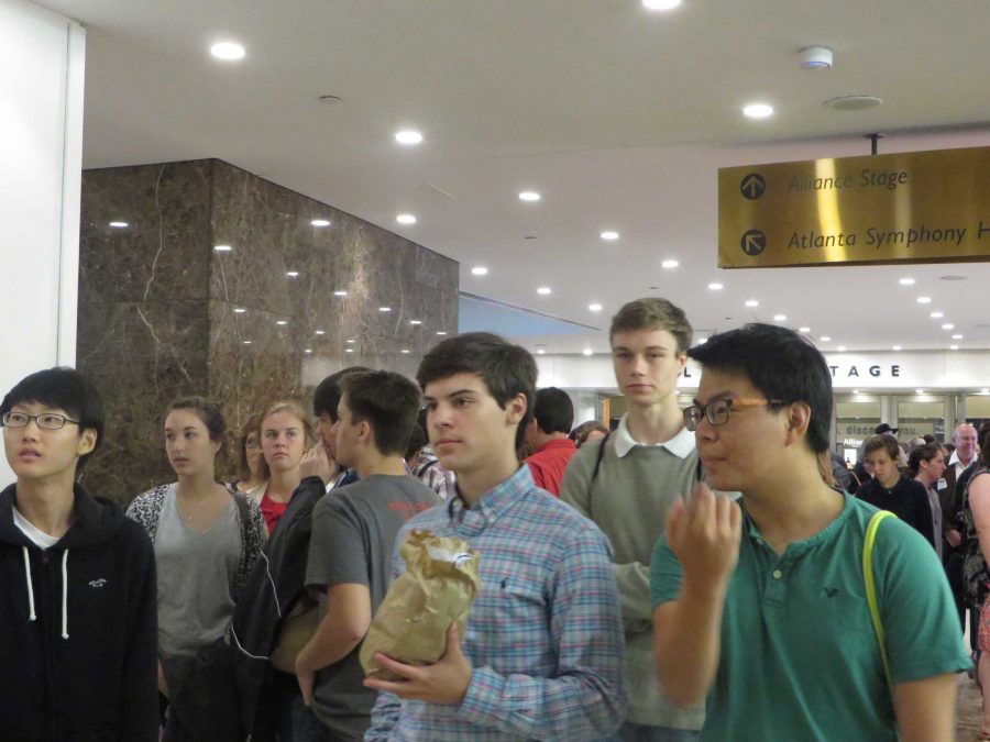 AP Lang and AP Lit Students line up to get into the theater before the play begins. 