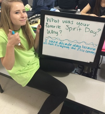Sophomore Aubrey James enjoyed escaping the century during decades day.