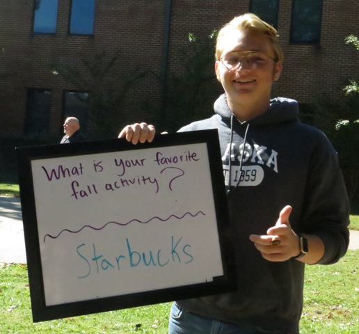 Junior Porter Enstrom enjoys the warm Starbucks drinks during the Fall time.