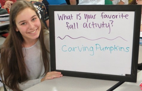 Junior Emily Molander enjoys carving pumpkins during the Fall time.