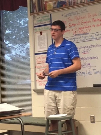 Senior Jay Booras delivers a speech concerning the melting pot that is considered the USA.