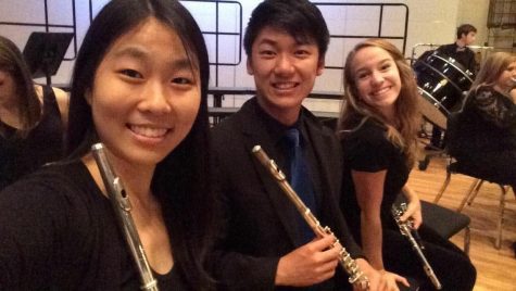 Flute majors Haiwen Gui (front),  Sean Chua (middle) and McIntosh senior Rachel Anders (back) pose at last summers GHP program.  