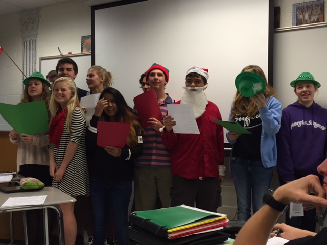 German junior students Alex Hampton and Nick Dunn celebrate the season with festive costumes and song.