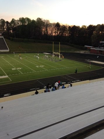 Junior Chandler Witucki takes a corner kick for the Lady Chiefs.