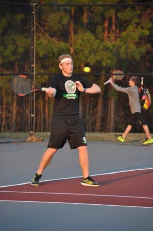 Junior Porter Enstrom plays an exhibition match against Northgate.