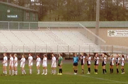 Both teams starters line up at half field and sing The Star Spangled Banner before the game.