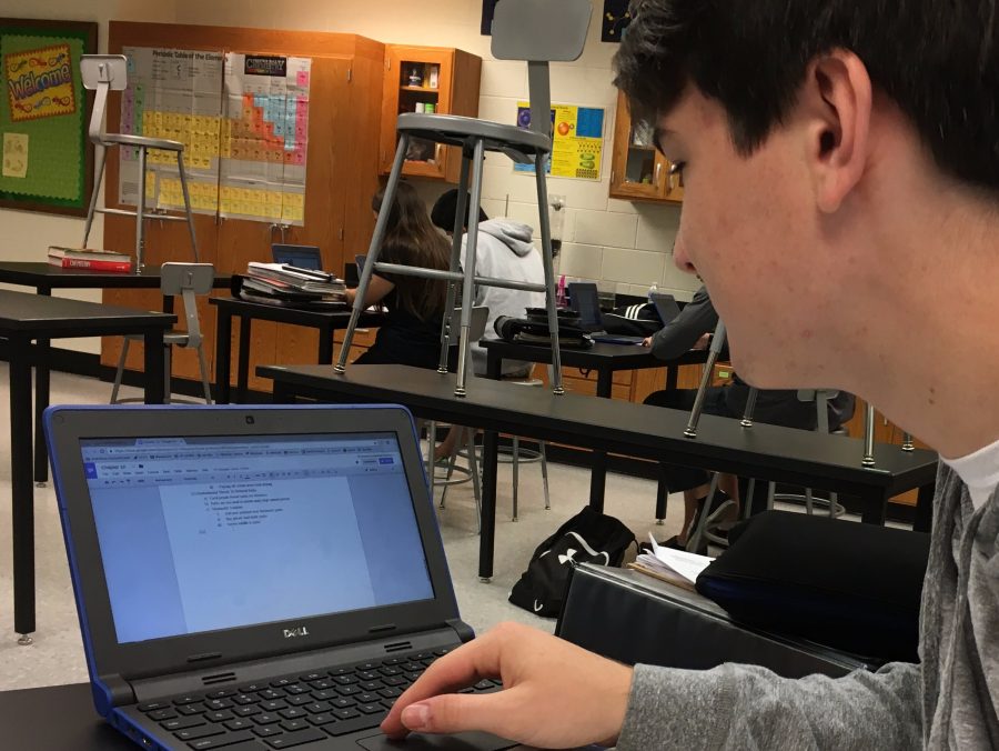 Senior Jacob Mewborn works on his Chromebook activity to try to finish before the bell rings. 