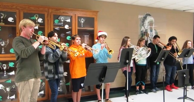 Band members perform for students before school