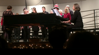 Faculty chorus starts their first song of the night.