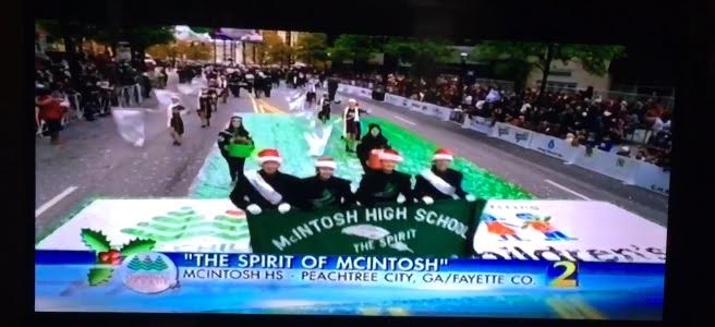 The+Spirit+of+McIntosh+marching+band+got+the+opportunity+to+participate+in+the+Childrens+Healthcare+of+Atlanta+Christmas+Parade.+The+parade+was+covered+by+WSB-TV+and+McIntoshs+turn+on+camera+is+pictured+above.+
