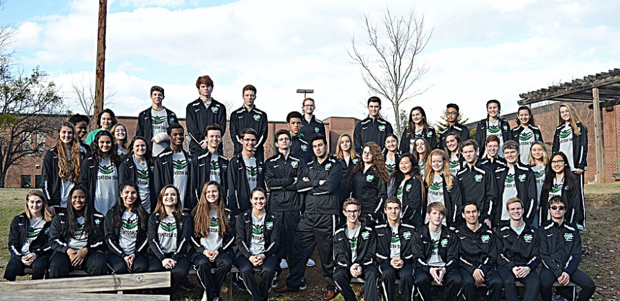 Swim members line up for yearbook photo.