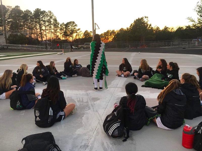 The team played the animal game to help pass time during the boys game before they played Fayette County at home.