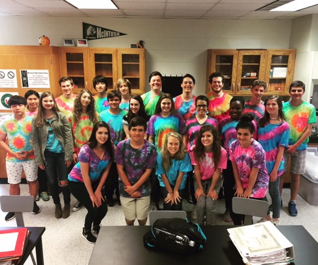 Ms. Shelley Dowses third period class proudly shows off their tie dyed shirts for a class picture.