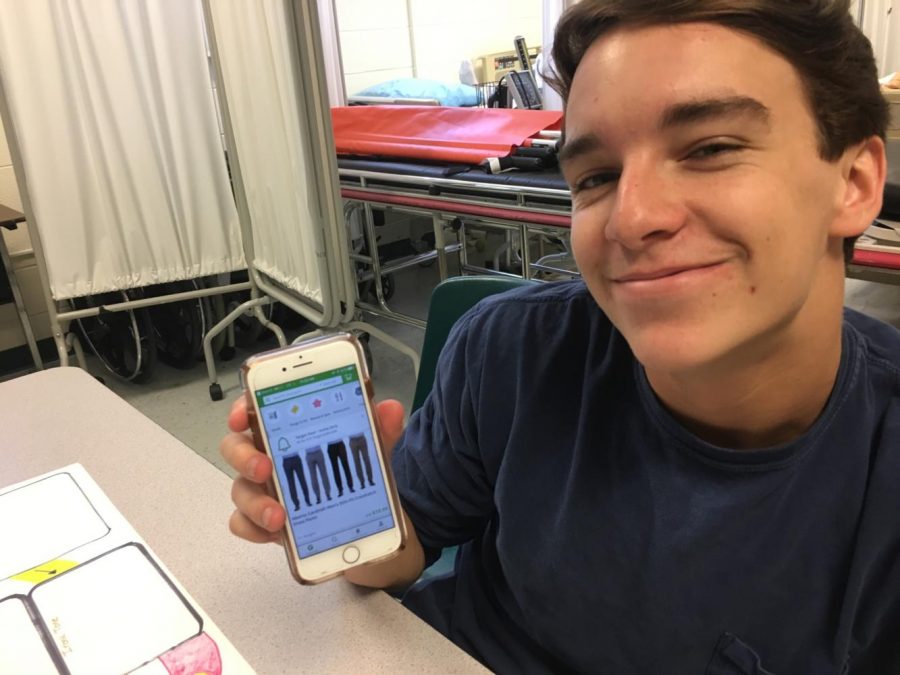 Senior Michael Wilson browses Groupon.