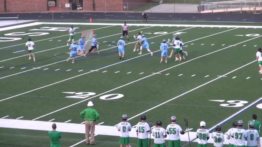 A McIntosh player advances to the goal.