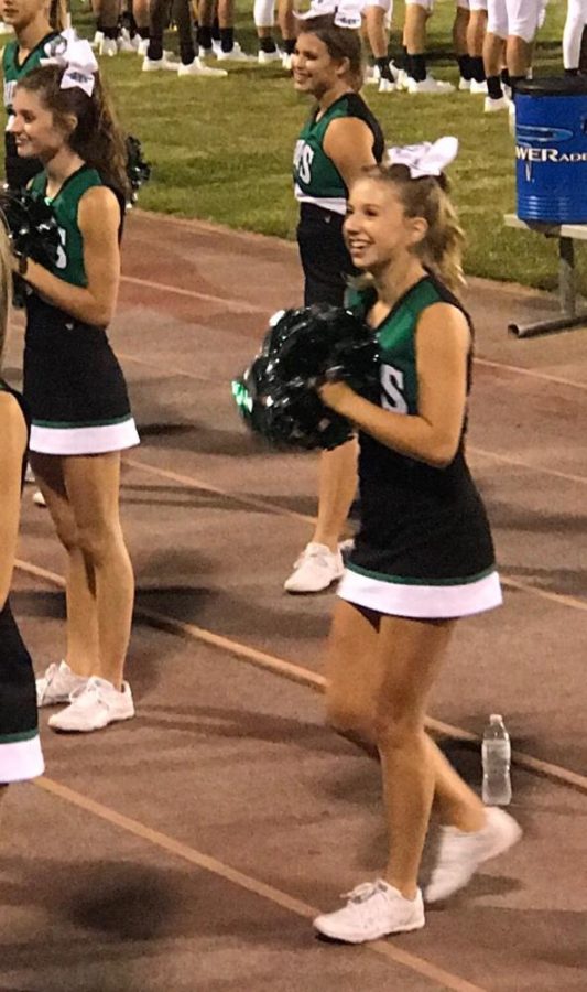 Junior Kasey King cheers on the Chiefs.