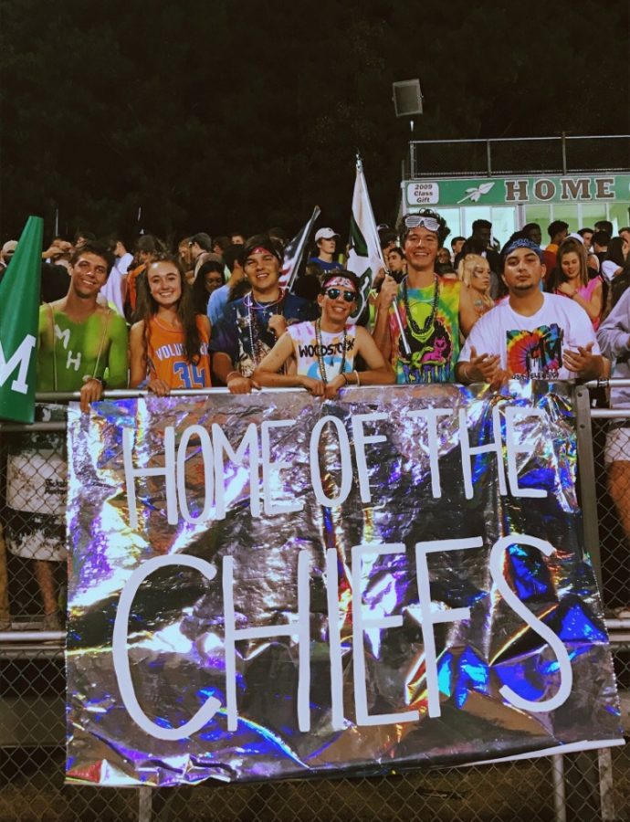 Seniors+go+all+out+for+the+rave+themed+homecoming+game+against+the+Riverdale+Raiders.