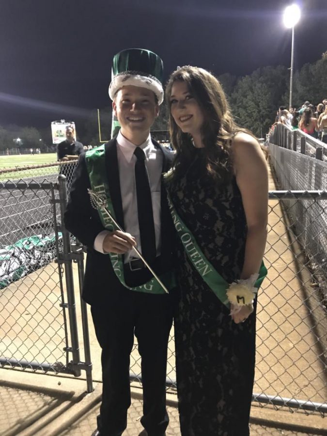 Seniors Oscar Zayas and Sally Gillanders celebrate winning Homecoming King and Homecoming Queen.