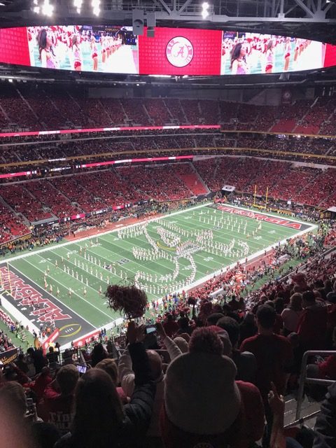 During pregame festivities, the Alabama band performed and shaped the Alabama emblem of an A to represent their university. 