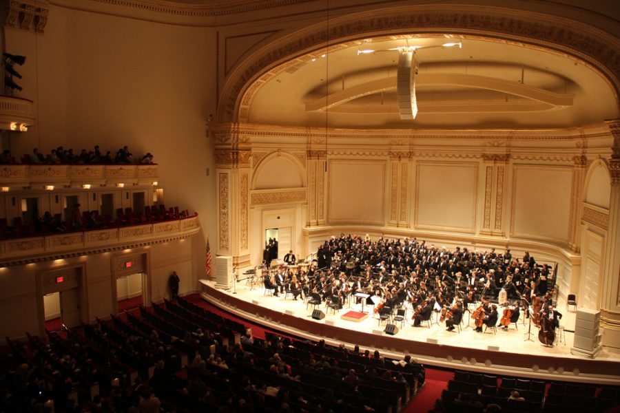 A symphony orchestra performs at Carnegie Hall for the USA-Japan Goodwill Concert in 2013.